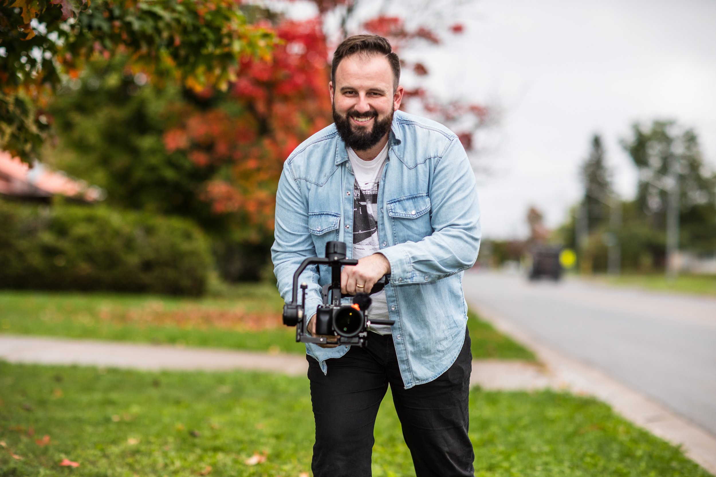 Jacob Cedolia filming outdoors with a professional camera rig